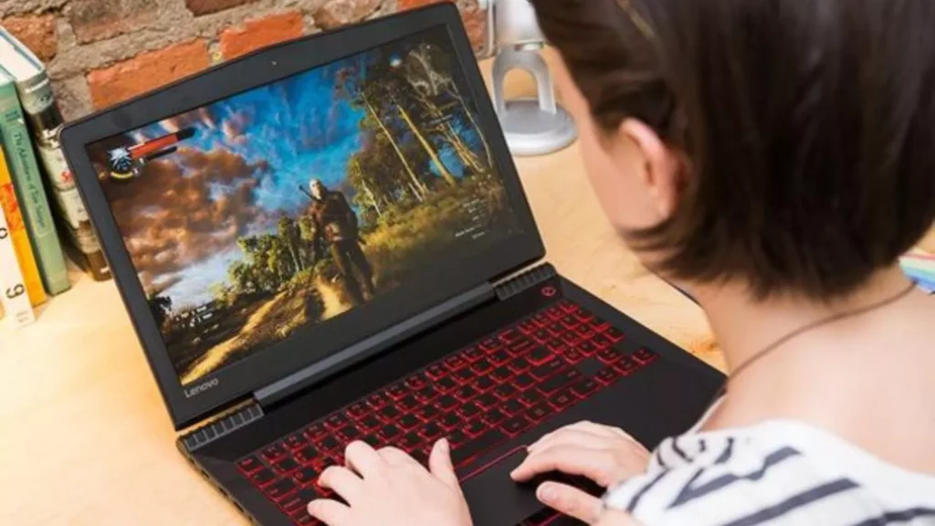 student using gaming laptop